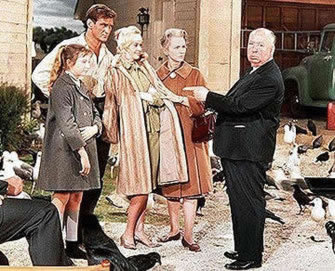 With Alfred Hitchcock director of THE BIRDS